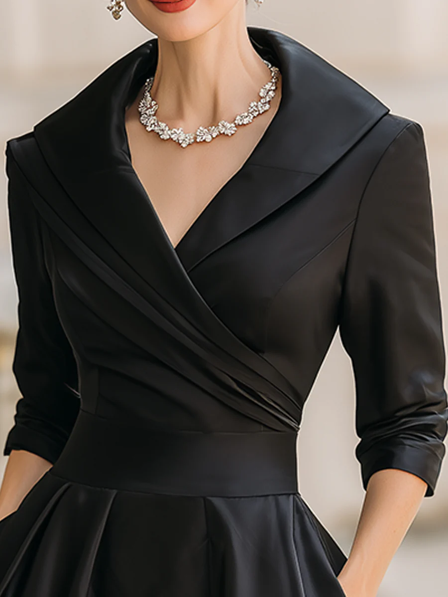 Elegant svart satin plisserad midi-klänning